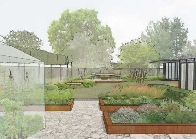 A walled vegetable garden area with raised corten beds and greenhouse in our historic garden in Bray.